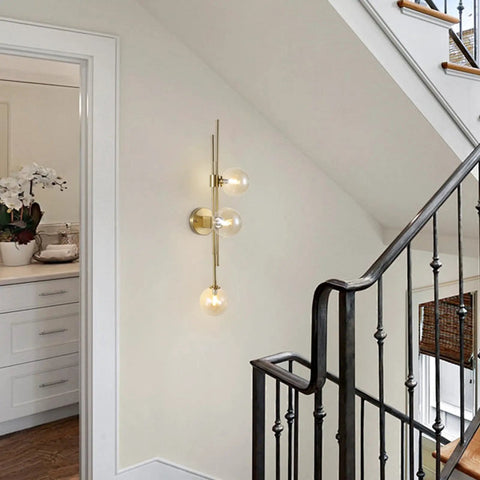Chic Three Light Globe Glass Wall Sconces With Amber Glass Shades Mid Century Modern Indoor Wall Light Fixtures in hallway