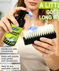 Woman holding brush and bottle from Premium Sneaker Cleaning Kit with foam cleaner for white shoes and all materials