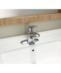 Colony Pro Single-Handle Centerset Bathroom Faucet With Durable Metal Construction Easy One-Person Install Memory Temperature Valve For Consistent Water Temperature Polished Chrome Finish Drain Not Included installed on a white bathroom sink