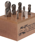 Made in USA Micrograin Carbide Ball Nose End Mill Set Built Tough for Precision on wood stand, six pieces visible