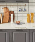 Kitchen with Slick Matte Black Cabinet Pulls Square 5 Inch Center To Center Drawer Handles on gray cabinets and backsplash
