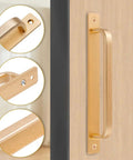 2 Pack Barn Door Handles for Cabinets and Drawers, Aluminum Alloy Flush Flat Base Pulls in Gold, 7.56 Inch, shown on wooden door