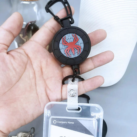 Heavy Duty Retractable Keychain With Carabiner Badge Holder And Tactical ID Reel in hand, featuring a Rotating Totem design.