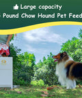 Heavy Duty Automatic Dog Feeder Holds A Ton Of Twenty Five Pounds Of Dry Kibble Rugged Galvanized Steel Outdoor Pet Bowl Station With Paw Pressed Door For Big Dogs Built Tough For Busy Parents in green outdoor setting.