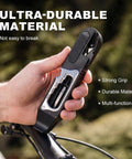 Hand holding All In One Bike Repair Kit With 14 In 1 Tools, Portable Multitool showing strong grip and durable material