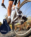 Cyclist on a bike with mountain backdrop, showing 4 Pairs Semi Metallic Bicycle Disc Brake Pads For Tektro IOX Novela Smooth Braking