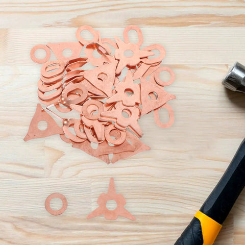 50 Pcs Dent Puller Rings for Auto Body Repairs Iron Material on wood surface with hammer