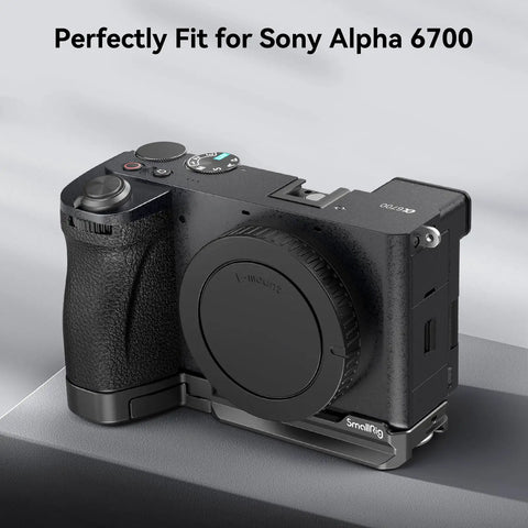 Baseplate For Sony Alpha 6700 With Built In Arca Quick Release Plate And Bottom Mount, attached to camera body on table.