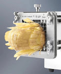 Professional Electric Potato Chip Cutter And Commercial French Fry Slicer Machine Made With Durable Stainless Steel Blade For Home Kitchen Business Use 10mm Cut Size Easy To Clean Automatic Vegetable Chopper Device with potato being sliced.