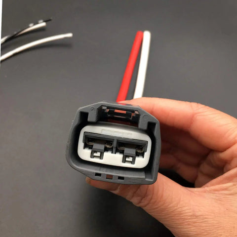 Close-up of a Set Of 2 Pigtail Connectors For Volvo And Ford Electric Power Steering Pumps EPS Wiring Harness Plug Kit