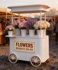 Slick Custom Mobile Food Cart With Roof And Heavy Duty Portable Vendor Display Kiosk For Coffee Snacks Desserts Trade Shows Plus Full Color Branding Makeover with flower arrangements on display.