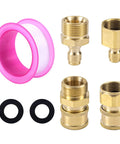 Front view of a four-piece brass pressure washer adapter kit (M22-15mm to 1/4in) with black O-rings and a pink cap.