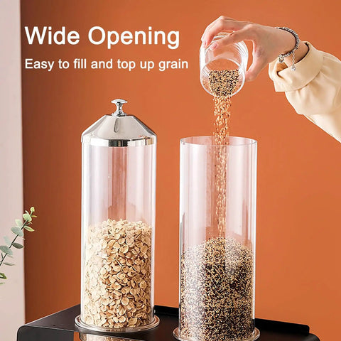 Triple Head Countertop Cereal Dispenser Delivering Hella Spacious 12 Liter Storage For Nuts Candy And Grains seen being filled with grains through wide opening.
