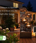 Five Tier Solar Outdoor Water Fountain With LED Lights 33 Point 5 Inch Tall Waterfall For Patio Or Backyard Easy Setup Solar Pump And Panel Included Decorative Pebbles Yard Vibe on patio at night