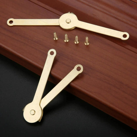 Gold Metal Lid Support Hinges Set Heavy Duty 2.68 by 0.31 Inch 2 Pack with screws shown on wooden background