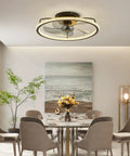 20 Inch Low Profile Ceiling Fan With Lights And Remote Dope Black Finish in modern dining room setting with art and plants.