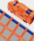 Rock Solid Heavy Duty Hoisting Lifting Cargo Net For Material Handling Built From Dense Weave Polyester, folded with strong straps.