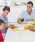 Family dining on Portable Plastic Folding Table 5 Feet For Camping Picnics Parties And Dining Durable HDPE Surface