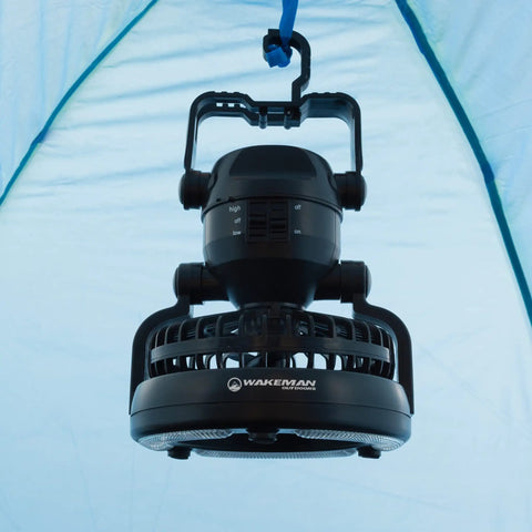 Hanging LED lantern fan inside two person dome tent for backpacking hiking or backyard adventures lightweight 2.75lb outdoor shelter.