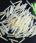 100 Pack Ultra Pro Grade Slim 3Mm Fluorescent Glow Light Sticks scattered for night fishing on black surface