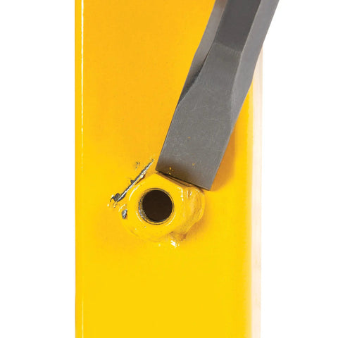 Close-up of chisel from 28 Piece Punch And Chisel Set With Roll Up Pouch in use on yellow metal surface for carpentry projects