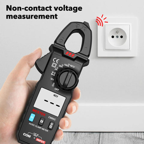 Person using Digital Clamp Meter Multimeter With True RMS Auto Ranging 100A 600V Measures AC DC Current And Voltage near socket.