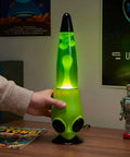 13 Inch Alien Head Wax Motion Lamp With Swirling Color Lights on a desk, enhancing room ambiance with a sci-fi touch.