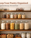 Glass Canister Set 34 Oz Each, 3 Pack Clear Jars on pantry shelves holding various dry goods