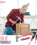 Woman using tools from the Pink 38-Piece Essential Tool Box Set With Storage Case For DIY Dorms And Home Quick Fixes Ergonomic Non-Slip Steel Hand Tools Compact Handy Kit For Everyday Repairs And Weekend Projects