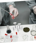 10 Pieces Lab Flow Control Tubing Clamps With Spiral Screw Design on a lab table with chemical equipment