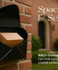 Built Tough Black Wall Mount Mailbox For Outdoor Use 12.5 X 5 X 10 Inch Weatherproof Envelope Mailbox open with package on brick wall