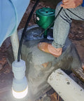 Domestic Hydroelectric Generator 500W To 5KW 220V Axial Flow Water Turbine installed on a concrete base with visible wiring.