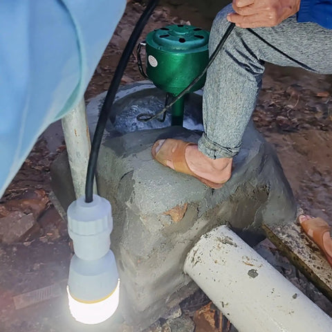 Domestic Hydroelectric Generator 500W To 5KW 220V Axial Flow Water Turbine installed on a concrete base with visible wiring.