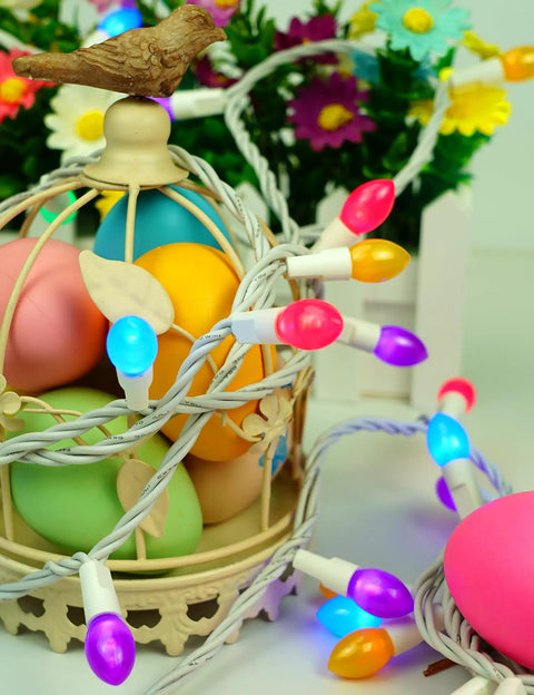 Dope Easter String Lights 50 LEDs, 17 Foot Multi Color Pastel Glow On White Wire wrapped around a decorative birdcage with eggs