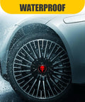 Dope Skull Wheel Hub Center Cap Stickers Set Of Four Two Point Two Inch Metal Aluminum Rim Emblems on wet automotive wheel.