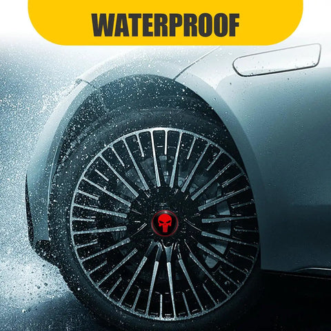 Dope Skull Wheel Hub Center Cap Stickers Set Of Four Two Point Two Inch Metal Aluminum Rim Emblems on wet automotive wheel.