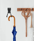 Tough As Nails Black Wall Hanger Hooks Built To Hang Coats Jackets Towels And Hats With Heavy Duty Screw In Brackets displaying an umbrella.