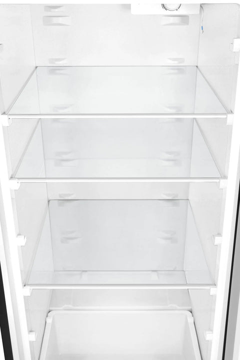 Interior view of 7 Cu Ft Upright Convertible Refrigerator And Freezer With Manual Defrost And Garage Ready Build in Brushed Stainless Steel.