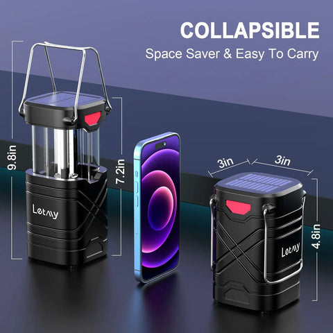 Collapsible 4 Pack LED Camping Lanterns With Solar USB Rechargeable AA Battery Power Options next to smartphone for size comparison.