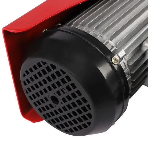 Close-up of the motor of Huge 1763 Lbs Max Load Mini Electric Hoist Winch with red casing and black vented cover.