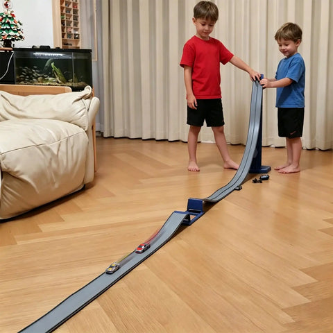 Children playing with Flexible Dual Lane Race Track With Jump Ramp Toy For Kids, 13 Feet Of Action, set up for side-by-side races indoors.