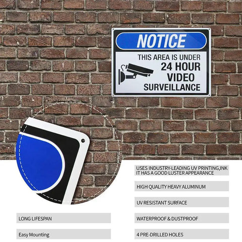 4 Pack Aluminum Security Notice Signs 14 By 10 Inches UV Printed This Spot Is Under 24 Hour Video Surveillance Signs Durable Warning For Home Office And Business Safety, showing sign on brick wall with close-up of mounting holes.