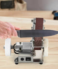 Slick 3 In 1 Mini Belt Sander And Electric Grinder With 7 Speed Adjustable Benchtop Station For Woodworking showing knife sharpening action.