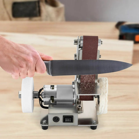 Slick 3 In 1 Mini Belt Sander And Electric Grinder With 7 Speed Adjustable Benchtop Station For Woodworking showing knife sharpening action.