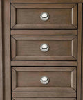 Two Pack One Half Inch Bifold Closet Door Knobs Polished Nickel Zinc Alloy Cabinet Handles on wooden drawers.