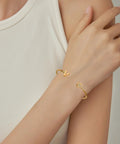 Personalized Dope Initial Letter Bangle For Women Gold Stainless Steel Heart Cuff With Zircon A To Z Name Pendant on wrist