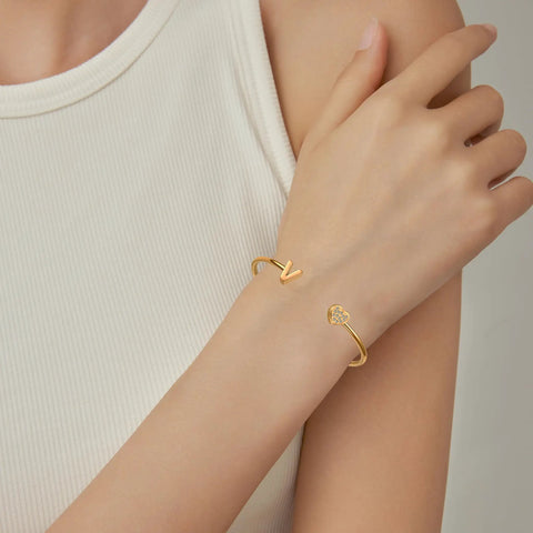 Personalized Dope Initial Letter Bangle For Women Gold Stainless Steel Heart Cuff With Zircon A To Z Name Pendant on wrist