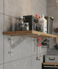 Beefy Heavy Duty Stainless Steel Wall Shelf Bracket L Shape Support mounted with wooden shelf holding jars and boxes in garage