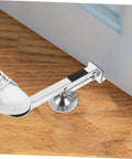Multi Function Door Lifter Tool For Drywall Panels And Door Installation Help, shown lifting door with foot lever on wood floor.