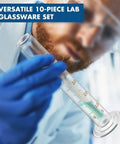 Scientist holding glass graduated cylinder from Beaker Set With 4 Glass Beakers And 4 Graduated Cylinders Plus 2 Stirring Rods For Chemistry Experiments Easy Read Measurements A Must Have Starter Lab Glassware Kit For Home Science Projects.